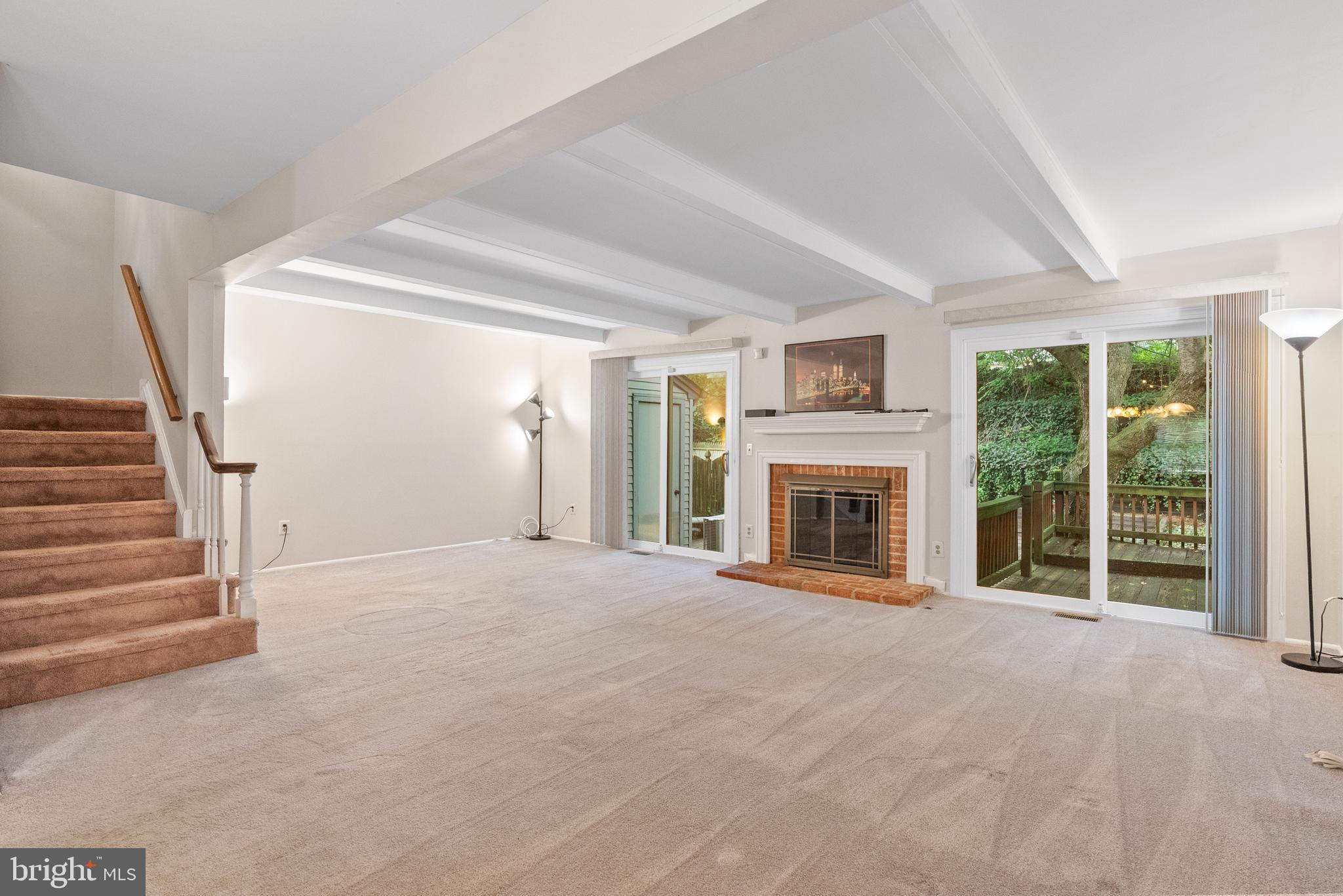 82 Farnwood Road Mount Laurel, NJ 08054 - Photo 5 of 22 a view of an empty room with fireplace and a window