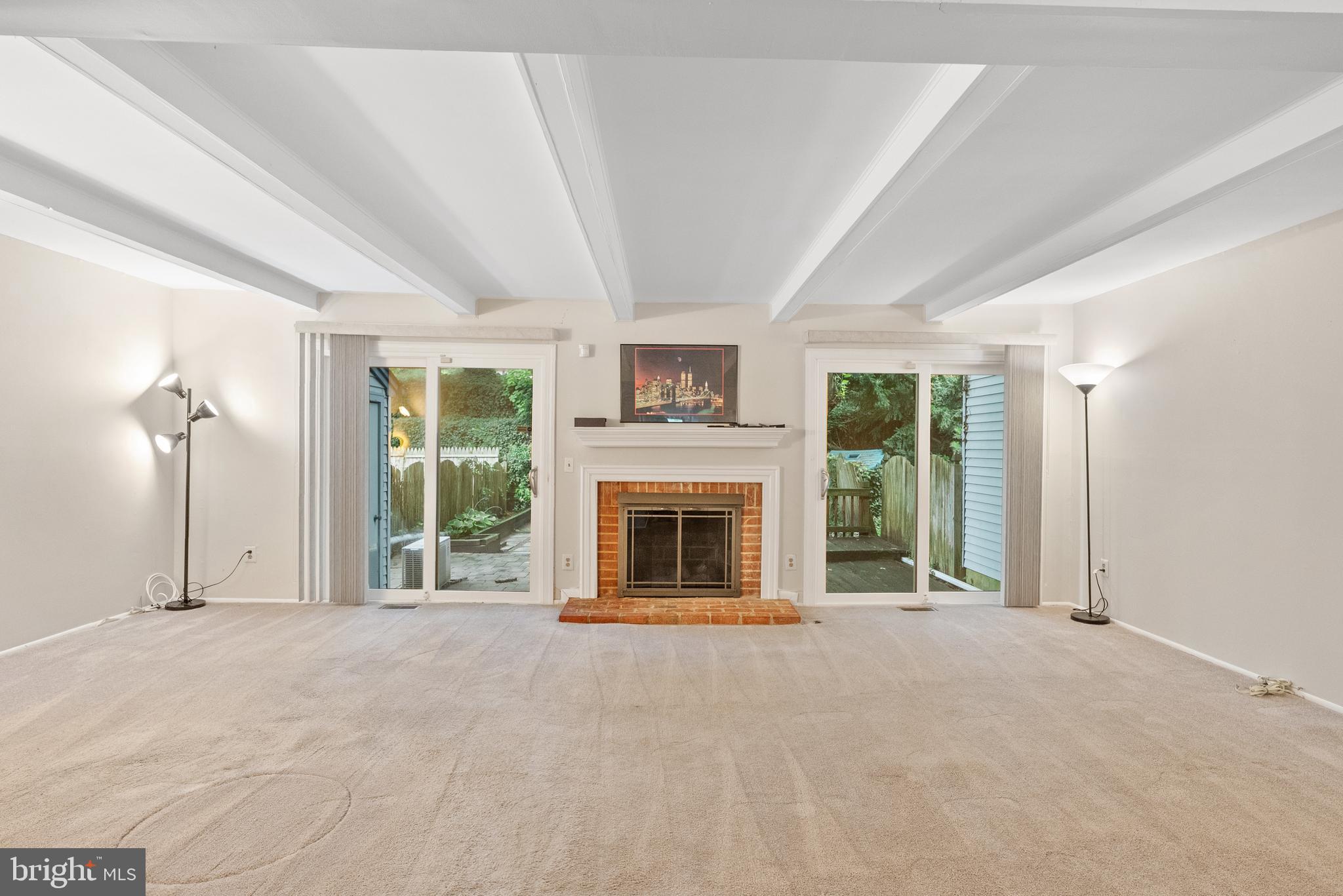 82 Farnwood Road Mount Laurel, NJ 08054 - Photo 7 of 22 a view of a livingroom with an empty space and a fireplace