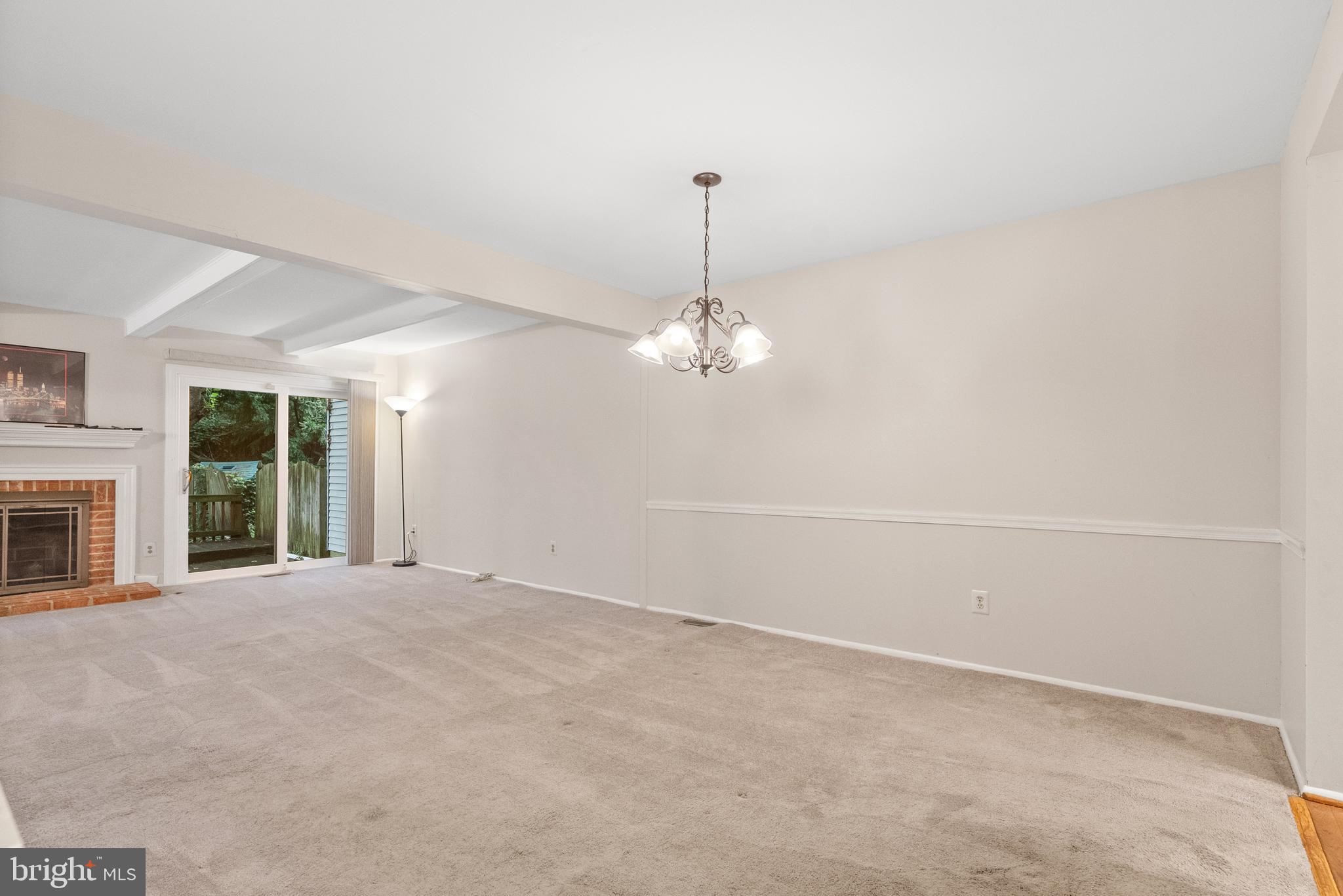 82 Farnwood Road Mount Laurel, NJ 08054 - Photo 8 of 22 a view of an empty room with a fireplace and a window