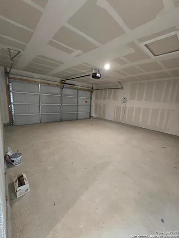 an empty room with a projector