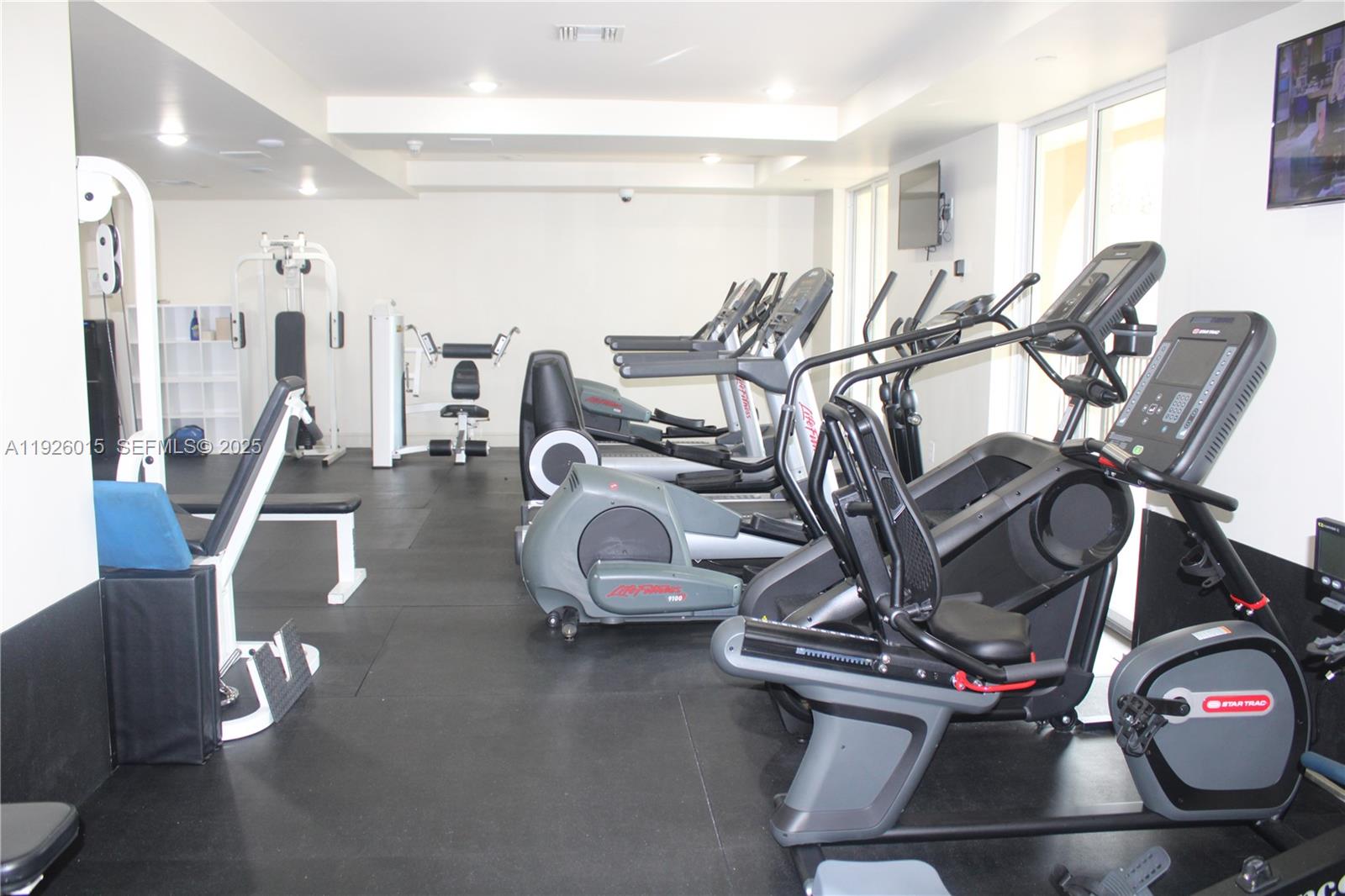 520 Southeast 5th Avenue, Unit 1109 Fort Lauderdale, FL 33301 - Photo 11 of 39 a view of a room with gym equipment