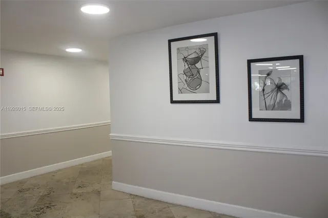 an empty room with a bathroom