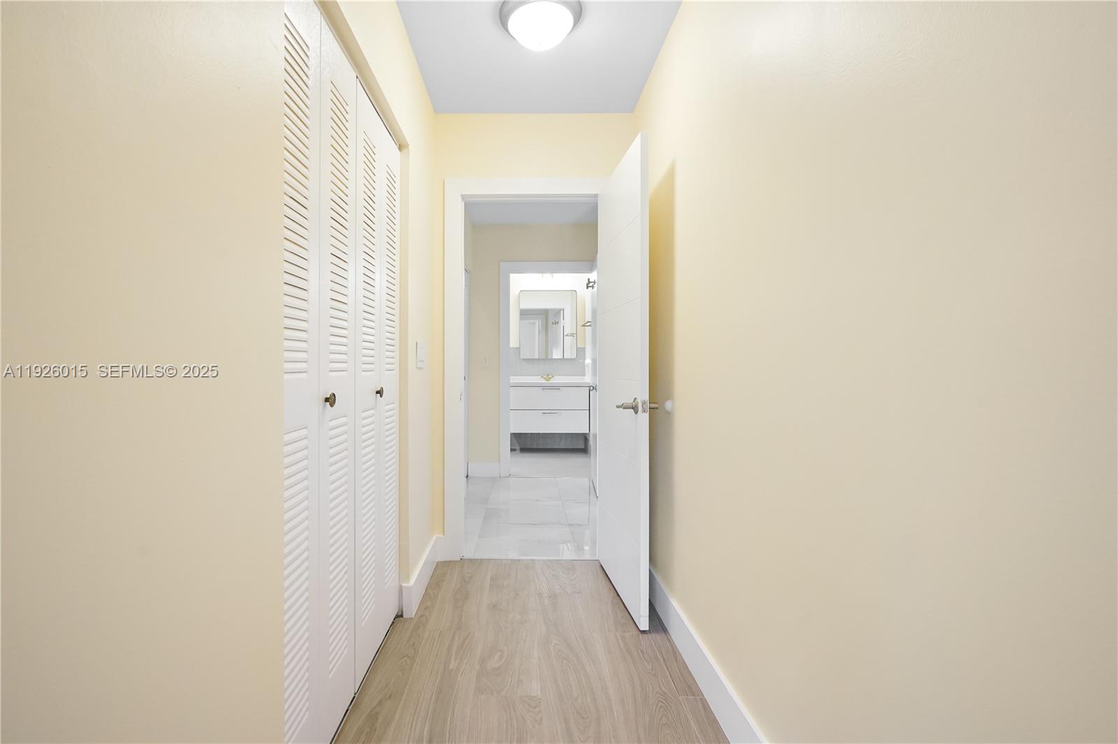 520 Southeast 5th Avenue, Unit 1109 Fort Lauderdale, FL 33301 - Photo 25 of 39 a view of a hallway with wooden floor