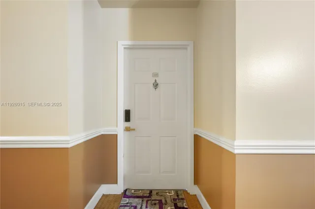 a view of a dining room with furniture chandelier and wooden floor