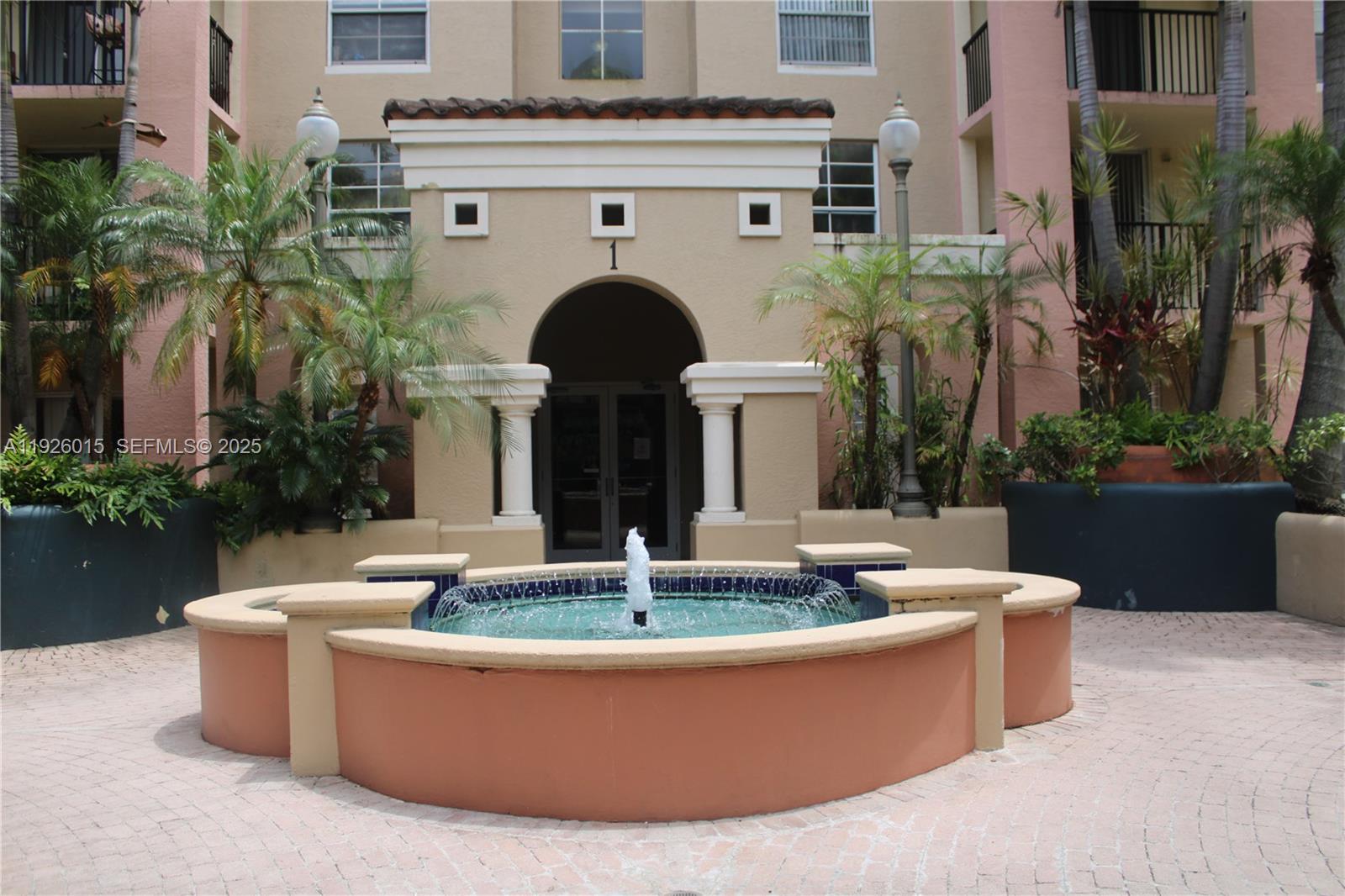 520 Southeast 5th Avenue, Unit 1109 Fort Lauderdale, FL 33301 - Photo 5 of 39 a view of a house with fountain in a patio