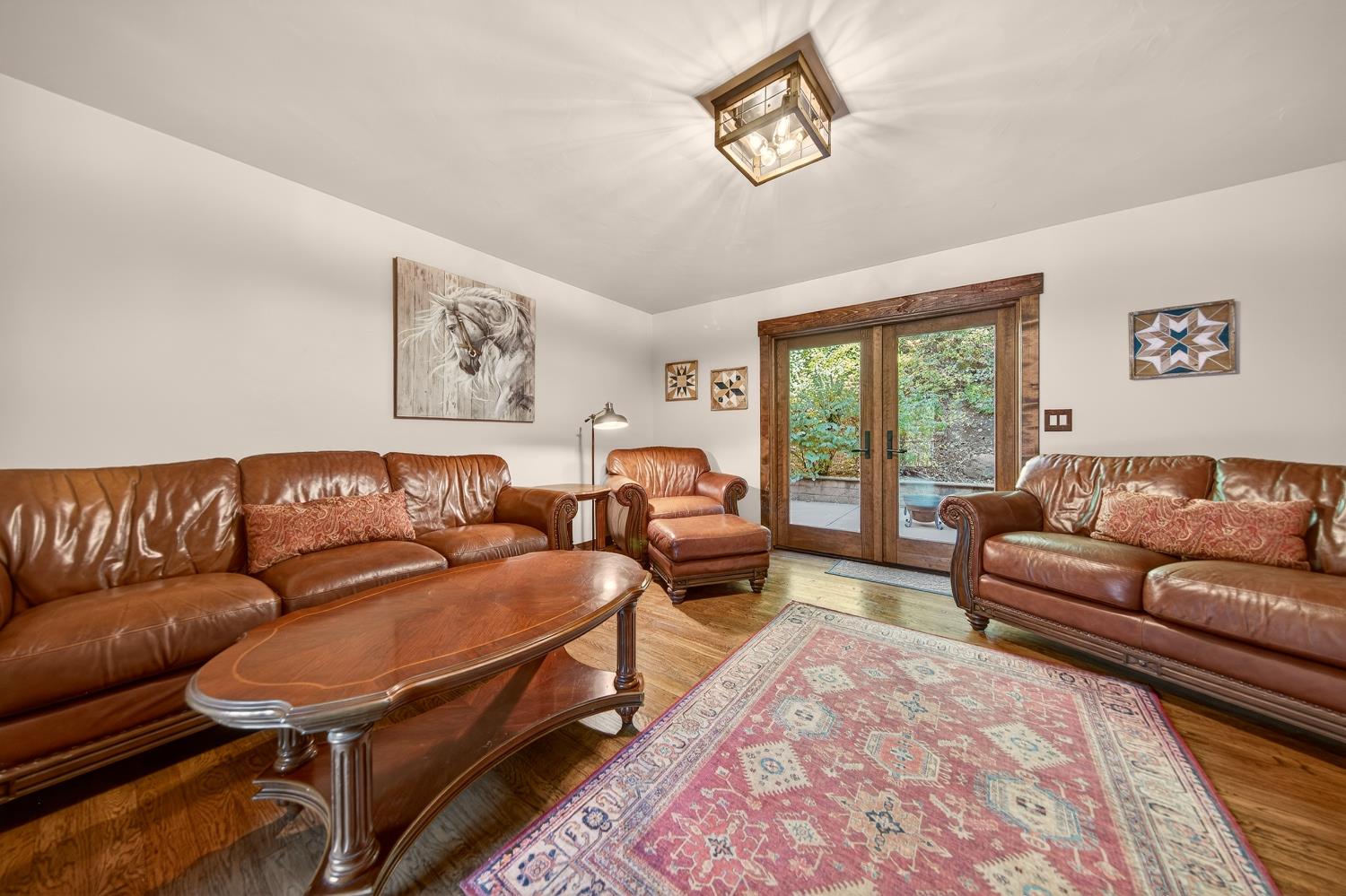 11234 Valencia Road Nevada City, CA 95959 - Photo 17 of 62 a living room with furniture and a window