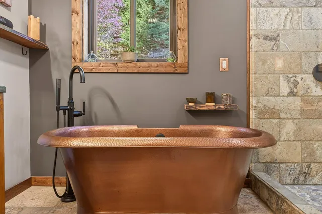 a view of workspace with hardwood wall ceiling fan