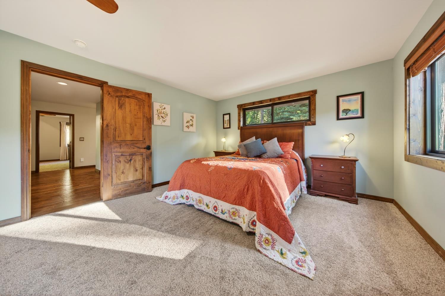 11234 Valencia Road Nevada City, CA 95959 - Photo 37 of 62 a bedroom with a bed and a dresser
