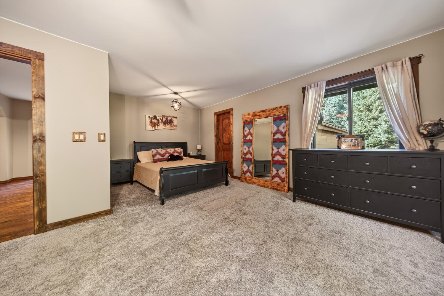 11234 Valencia Road Nevada City, CA 95959 - Photo 44 of 62 a living room with furniture and a dresser