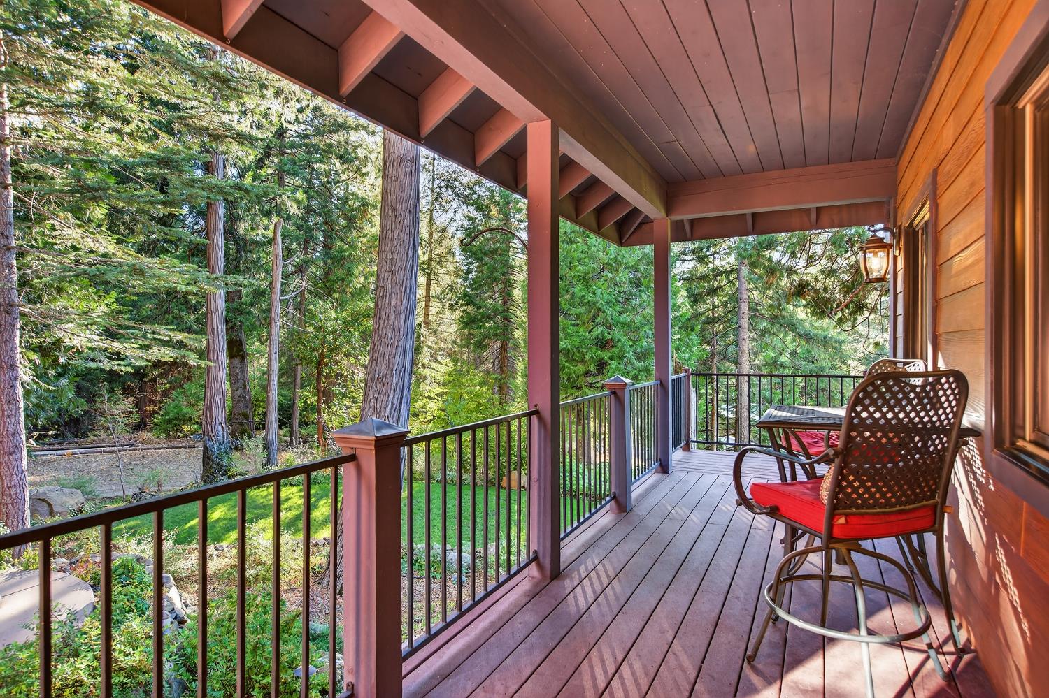 11234 Valencia Road Nevada City, CA 95959 - Photo 5 of 62 a view of a chairs and table in the balcony
