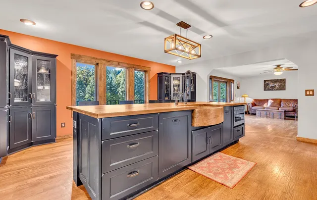 a large spacious bathroom with a large tub and sink