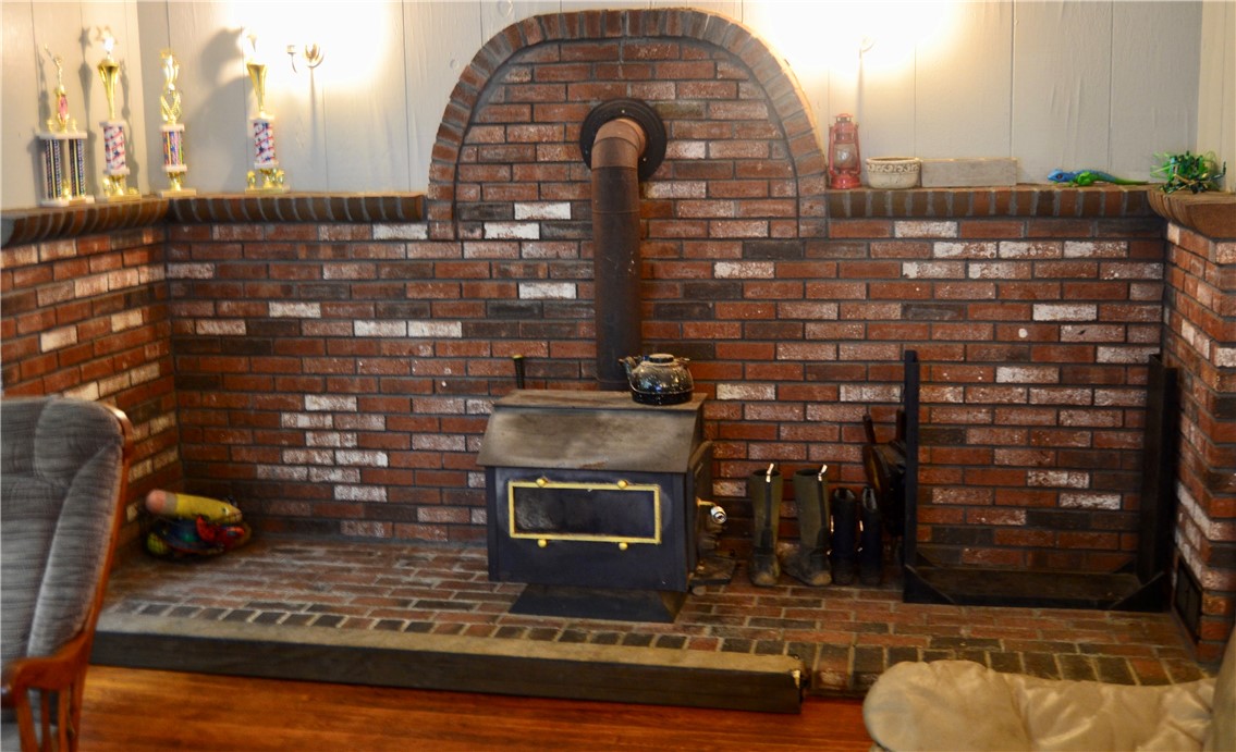 14 Slavin Path Glocester, RI 02814 - Photo 16 of 36 Wood stove area