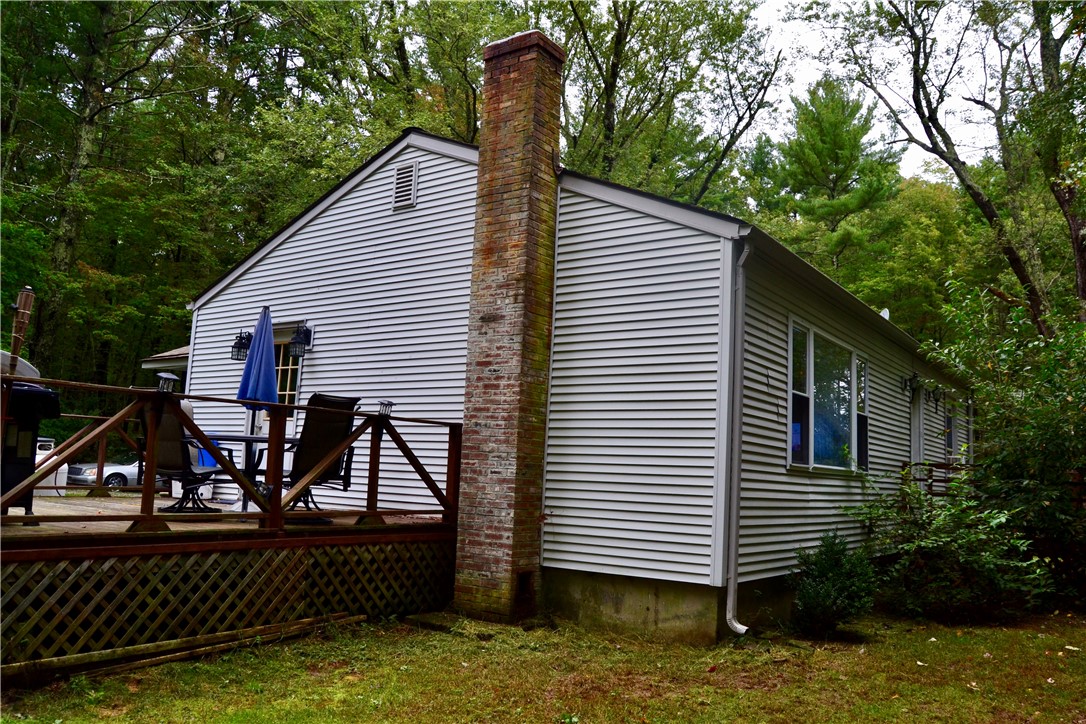 14 Slavin Path Glocester, RI 02814 - Photo 7 of 36 Chimney/Rear Deck