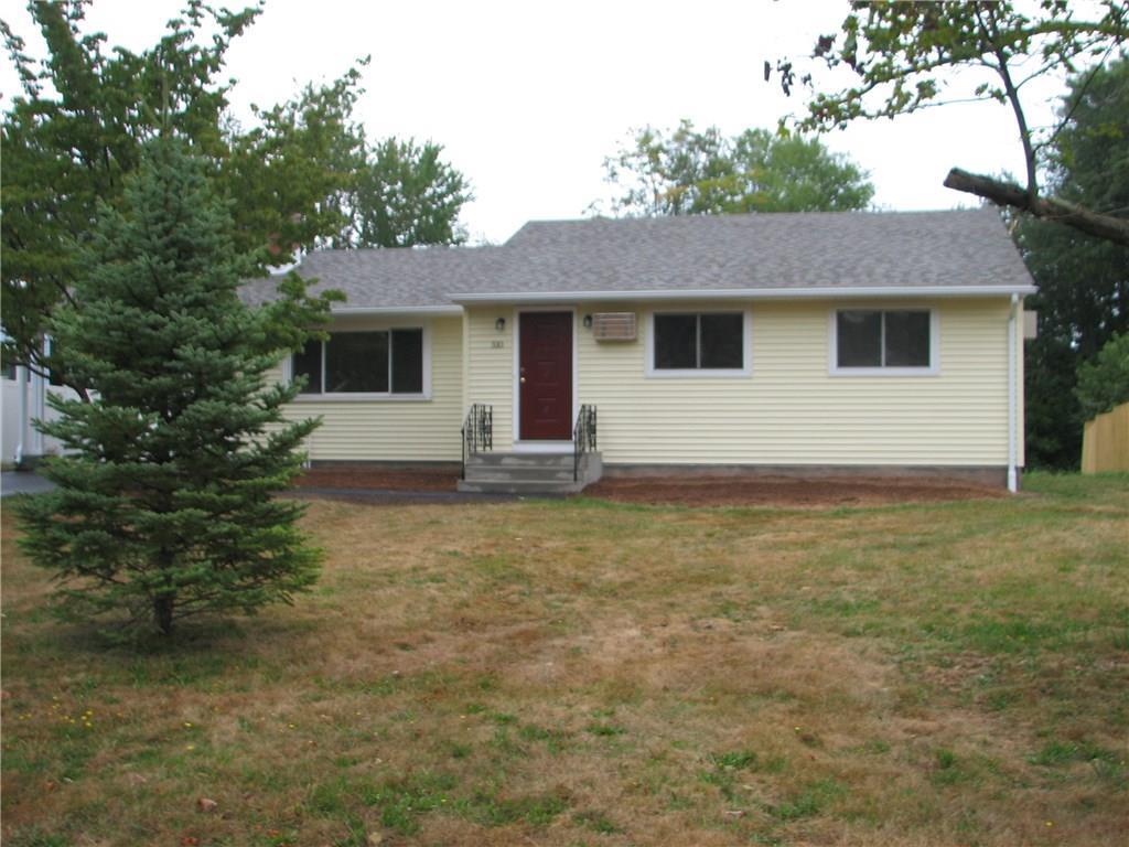 a front view of house with yard