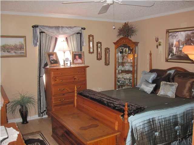 9860 Tower Ridge Road Pensacola, FL 32526 - Photo 8 of 12 Master bedroom