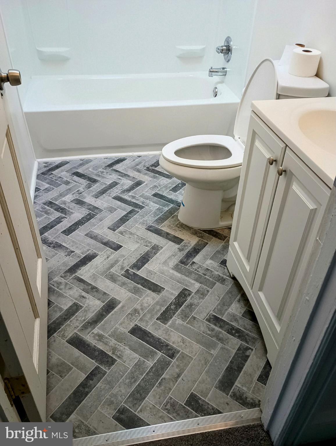 5140 Ranstead Street Philadelphia, PA 19139 - Photo 20 of 24 a bathroom with a sink and a toilet