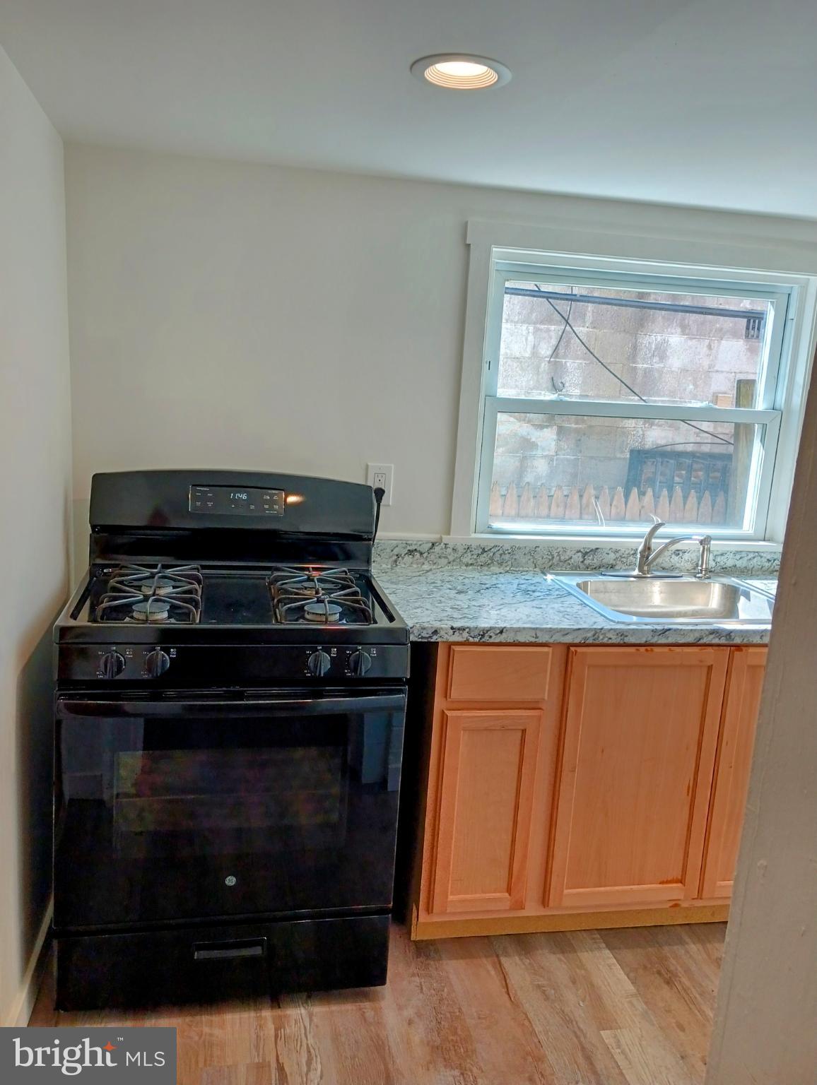 5140 Ranstead Street Philadelphia, PA 19139 - Photo 4 of 24 a stove top oven sitting inside of a kitchen