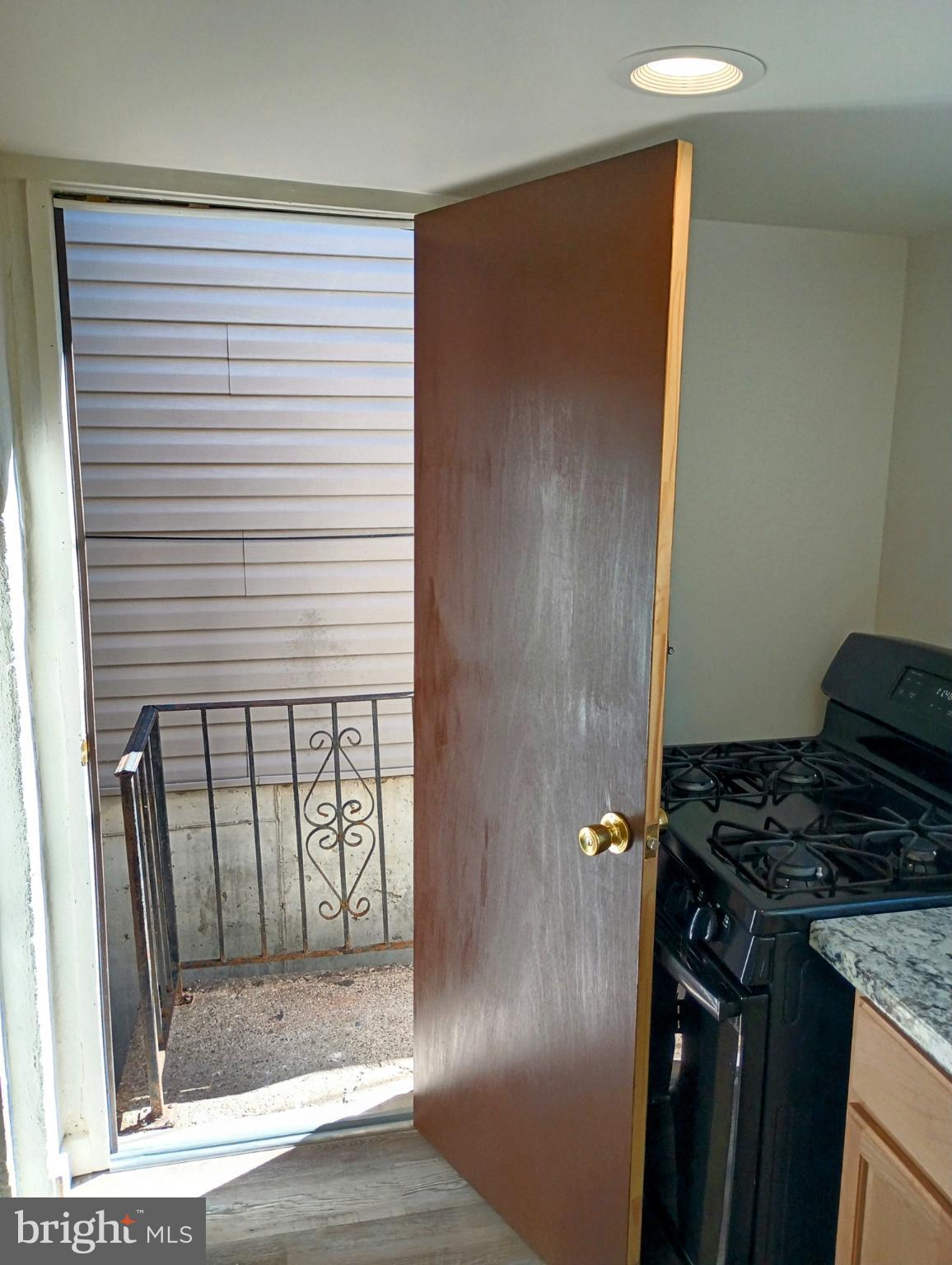 5140 Ranstead Street Philadelphia, PA 19139 - Photo 6 of 24 a kitchen that has a sink in it