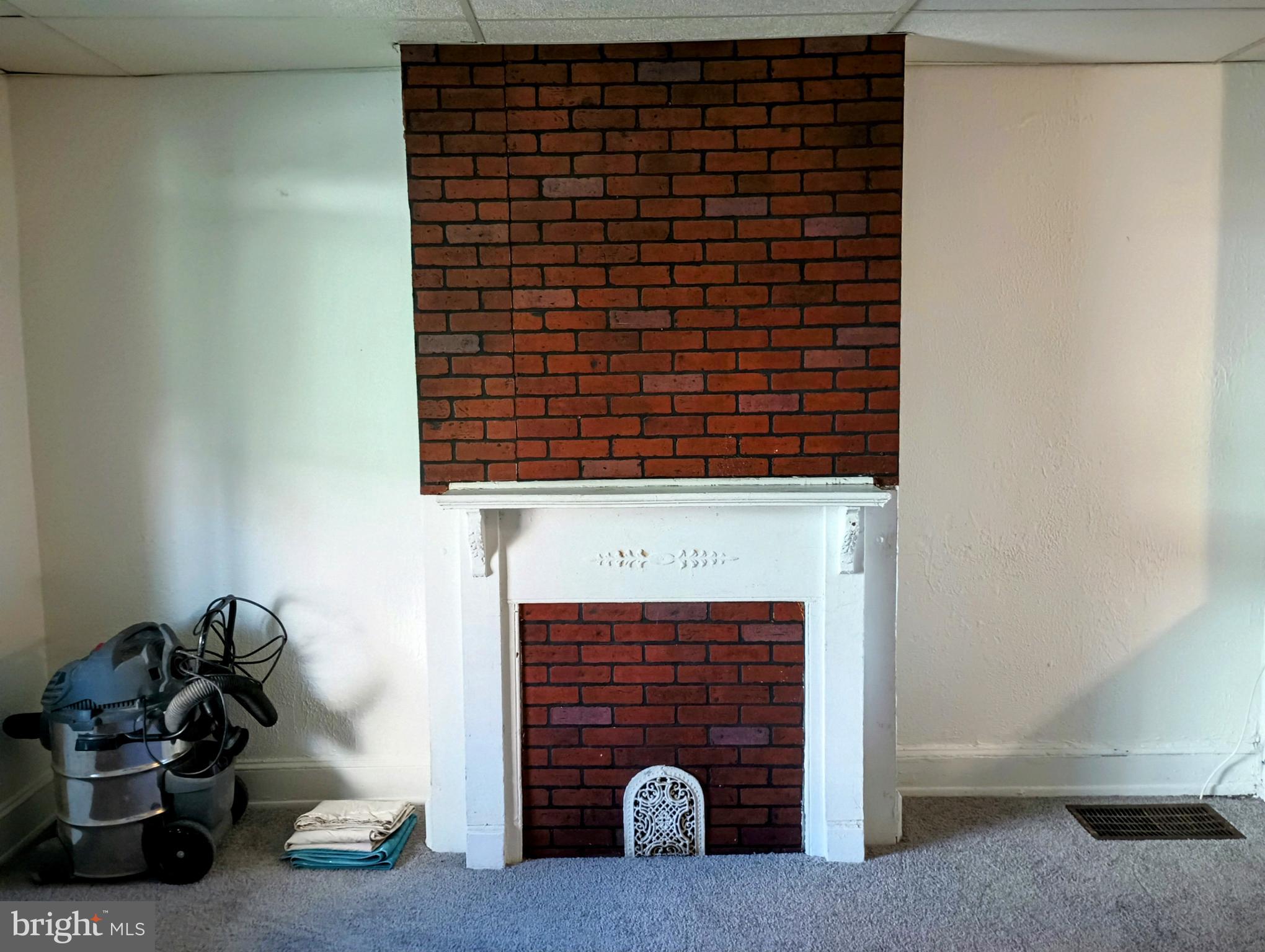5140 Ranstead Street Philadelphia, PA 19139 - Photo 10 of 24 a front door with a fireplace