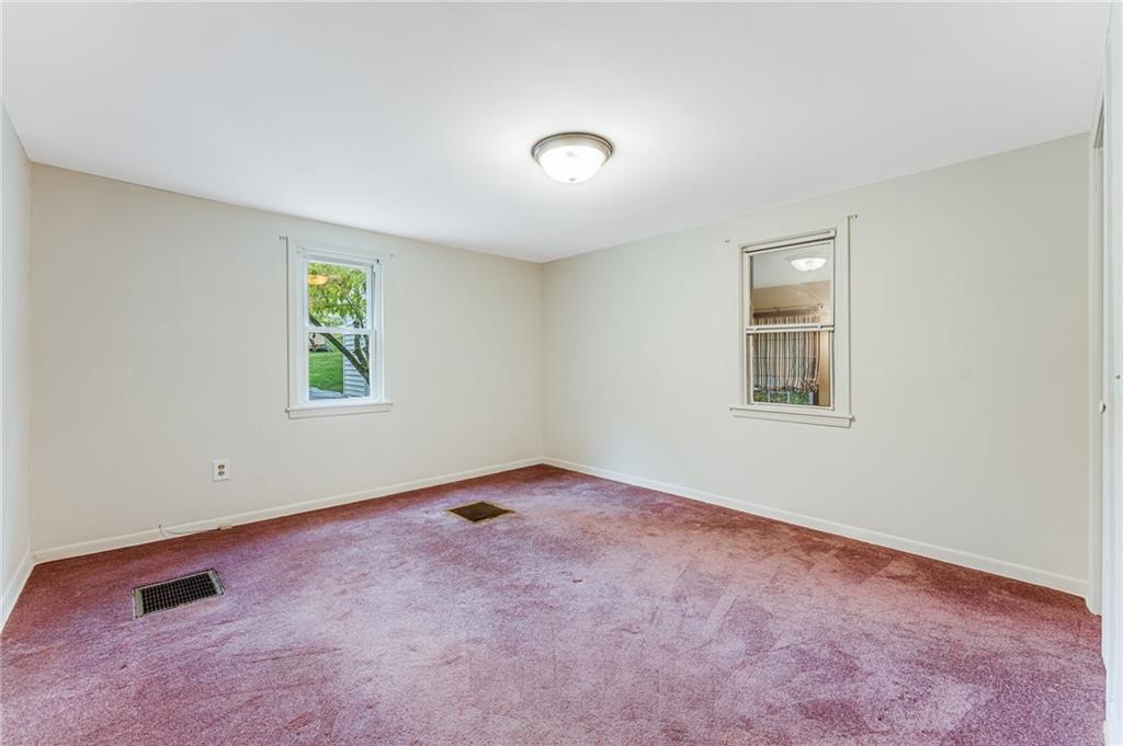 154 Hobbs Run Road Mount Morris, PA 15349 - Photo 13 of 32 an empty room with windows
