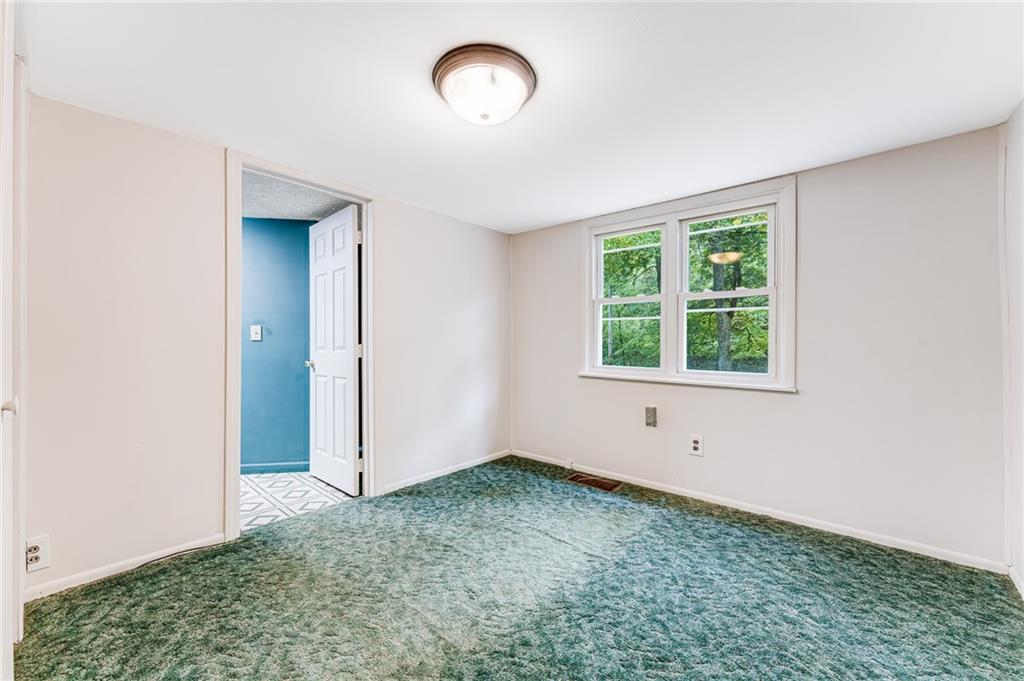 154 Hobbs Run Road Mount Morris, PA 15349 - Photo 17 of 32 an empty room with a window