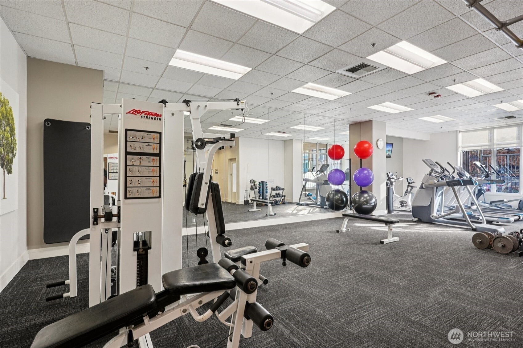 2801 1st Avenue, Unit 615 Seattle, WA 98121 - Photo 12 of 22 a view of a room with gym equipment