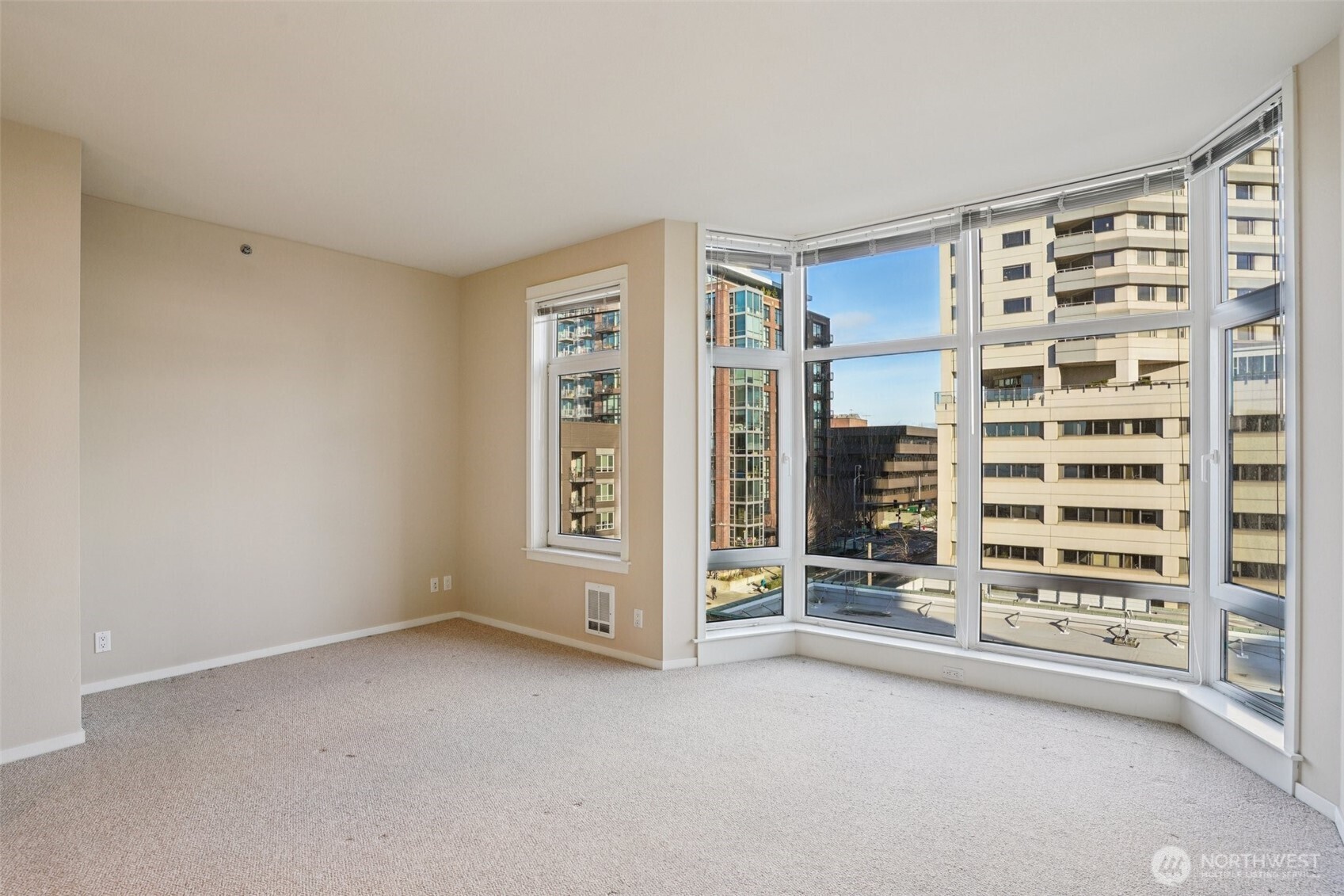 2801 1st Avenue, Unit 615 Seattle, WA 98121 - Photo 3 of 22 a view of an empty room with a window