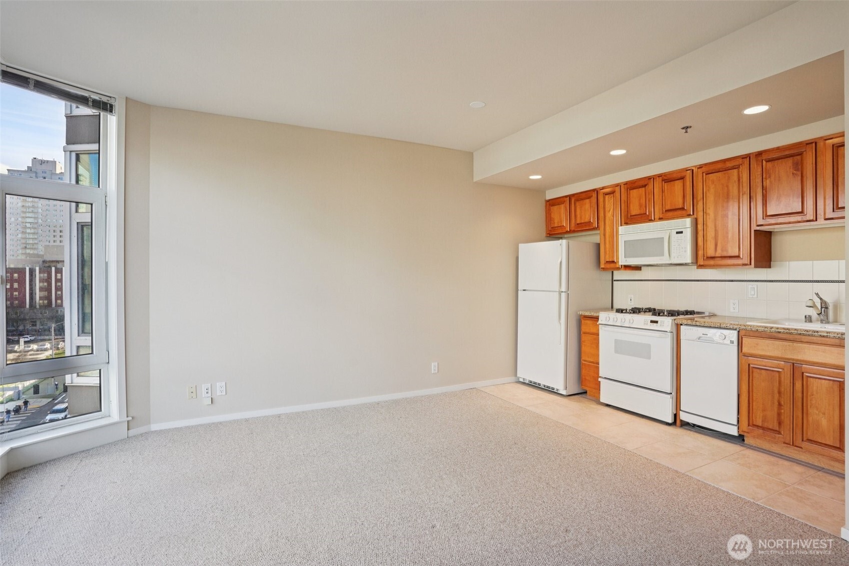 2801 1st Avenue, Unit 615 Seattle, WA 98121 - Photo 8 of 22 a view of a kitchen with a sink
