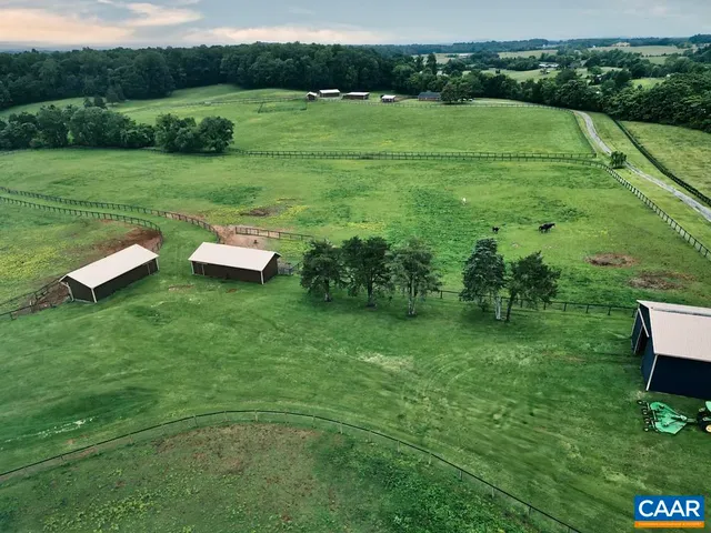 a view of a lake with a yard