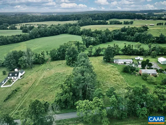 a view of a garden with a lake