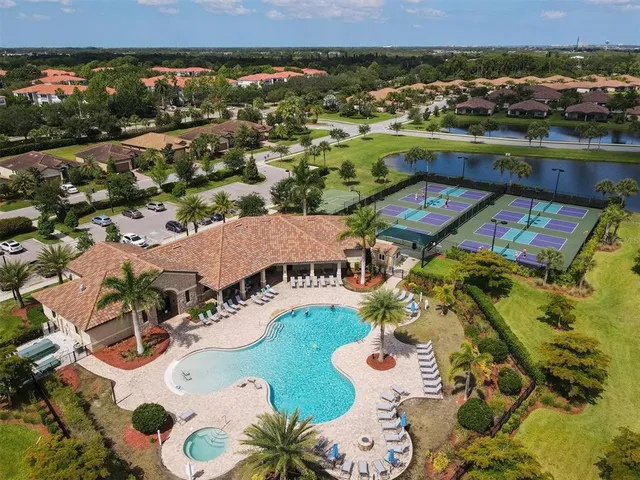 a view of a swimming pool with a chairs