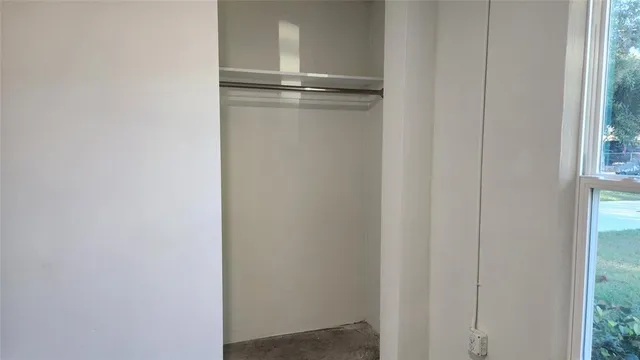 a view of a room with rack on the wall