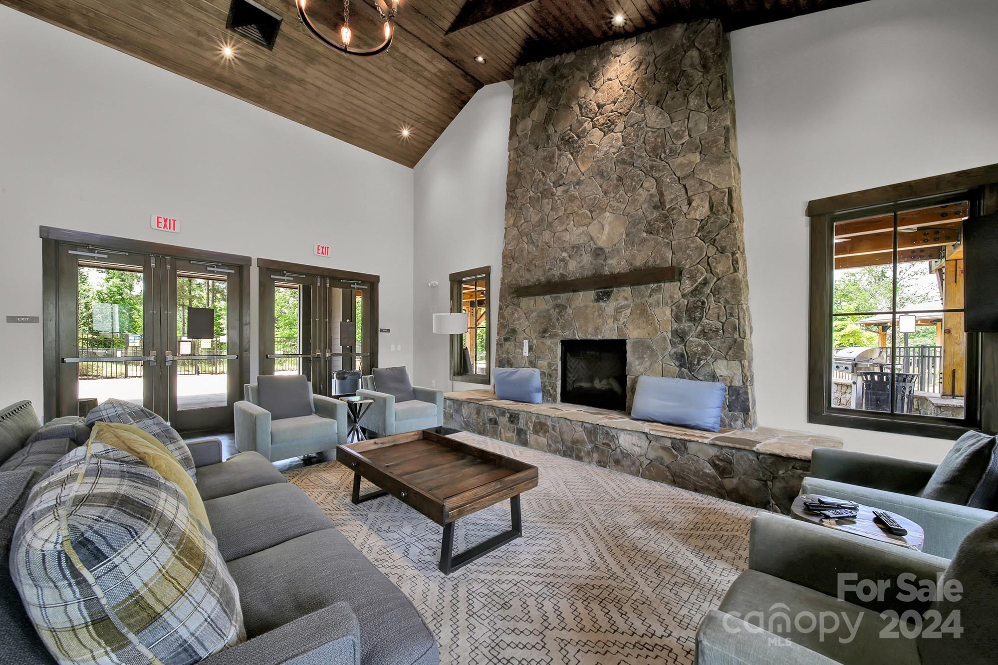 1174 Therns Ferry Drive Fort Mill, SC 29708 - Photo 45 of 48 a living room with furniture and a fireplace