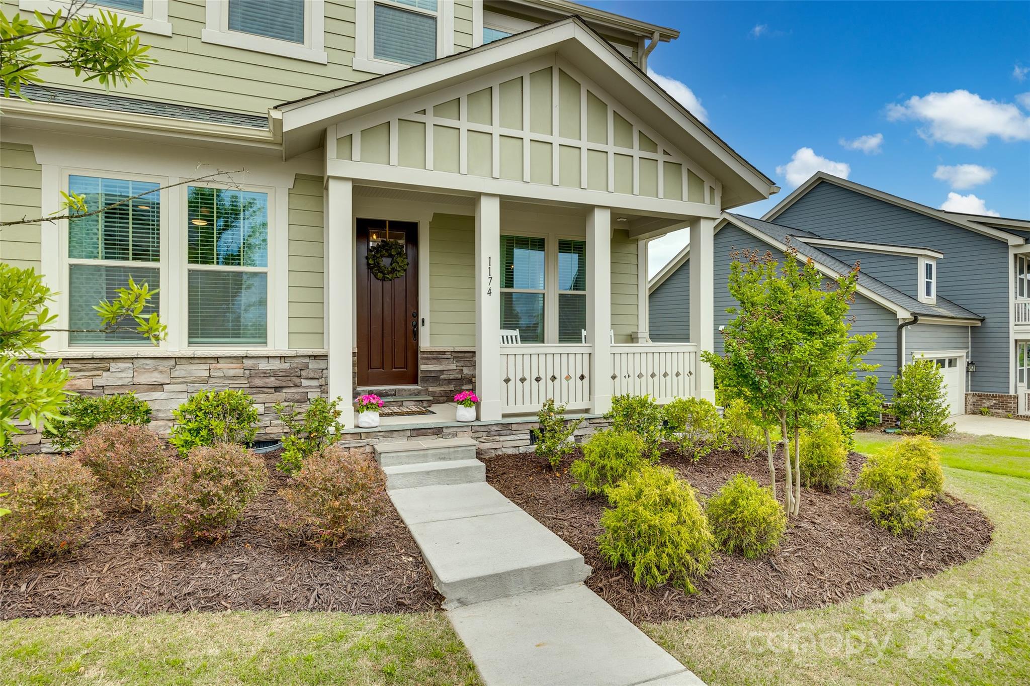 1174 Therns Ferry Drive Fort Mill, SC 29708 - Photo 7 of 48 a front view of a house with garden