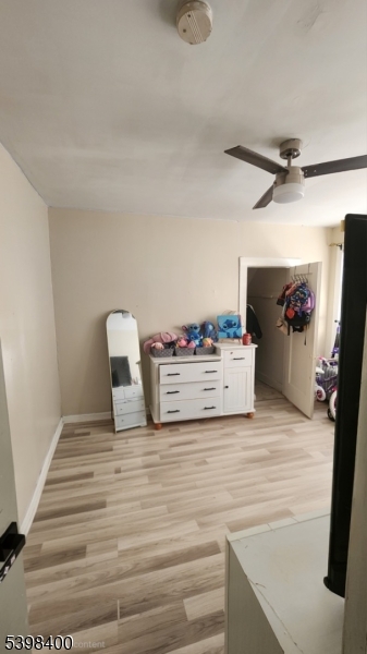 83 Vassar Avenue Newark, NJ 07112 - Photo 2 of 11 a view of empty room with wooden floor