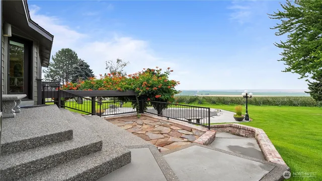 a view of a garden with an outdoor space