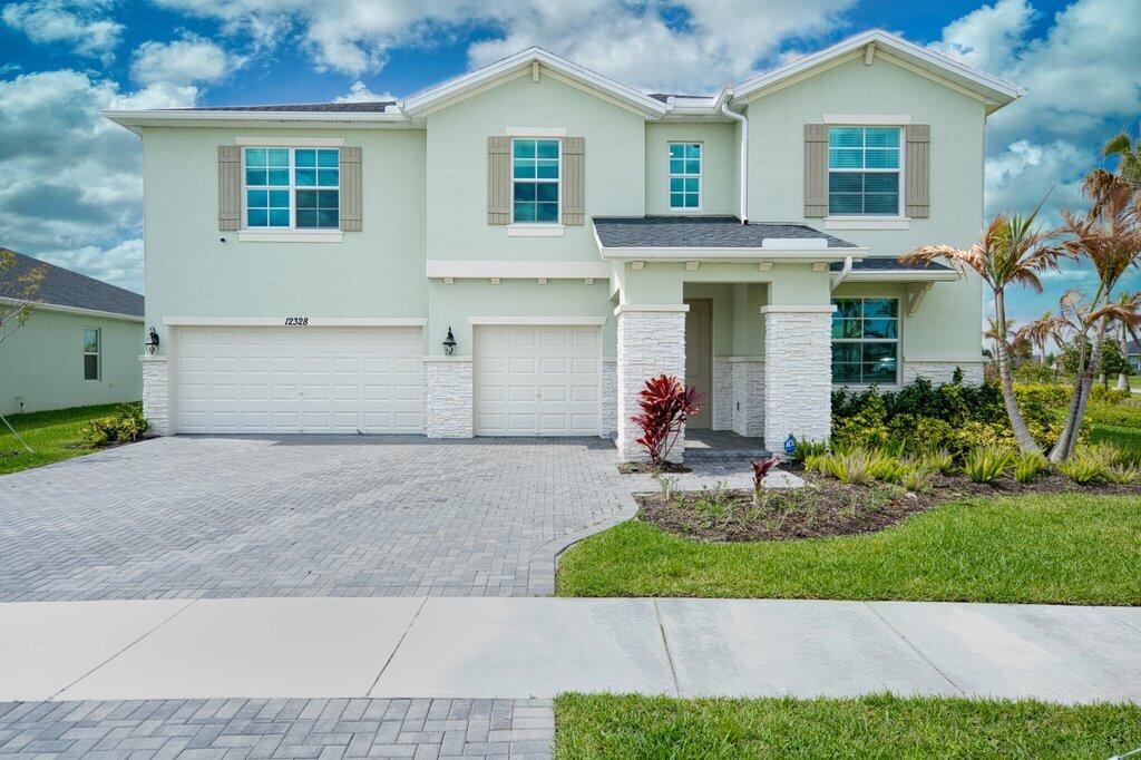 12328 Southwest Roma Circle Port St. Lucie, FL 34987 - Photo 1 of 72 Front Exterior Close.jpeg-SMALL