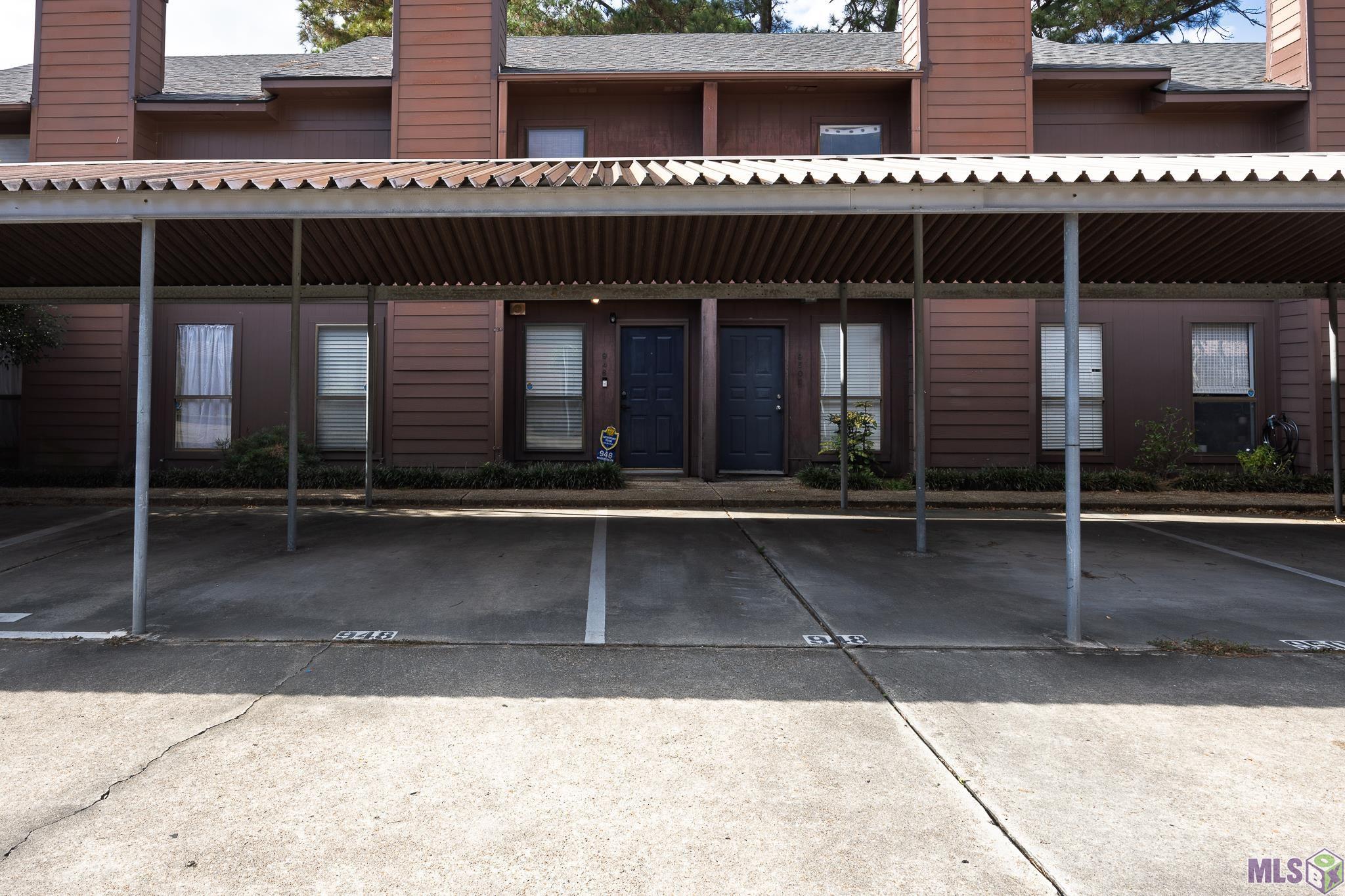 948 Ridgepoint Court, Unit 11B Baton Rouge, LA 70810 - Photo 3 of 19 Two Assigned Covered Parking Spots