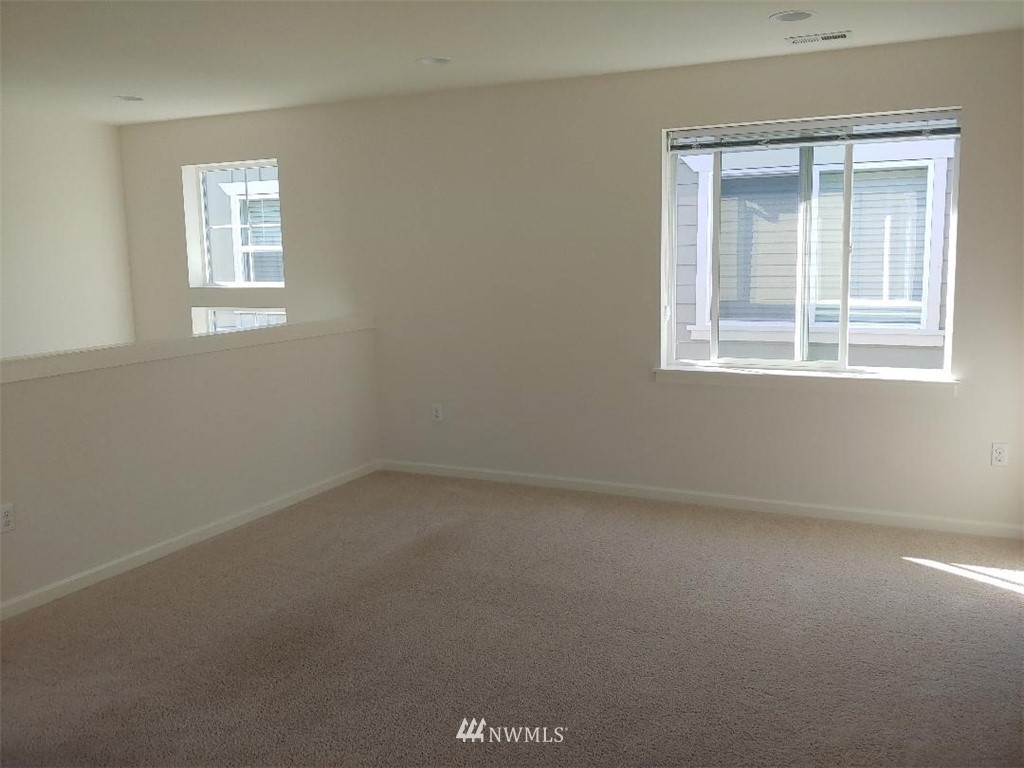 4422 185th Place Southeast Bothell, WA 98012 - Photo 17 of 28 an empty room with a window