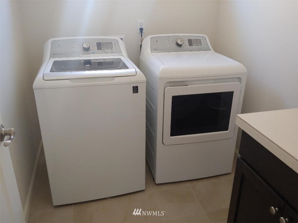 4422 185th Place Southeast Bothell, WA 98012 - Photo 20 of 28 a utility room with dryer and washer