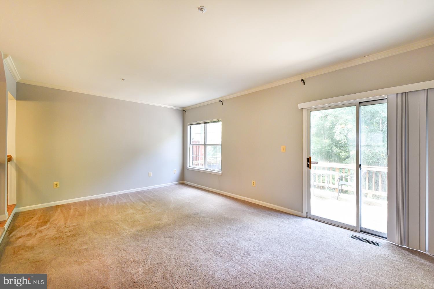 11220 Watermill Lane Silver Spring, MD 20902 - Photo 10 of 28 Living Room w/ Door to Deck