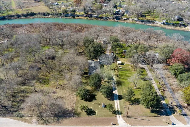 an aerial view of residential house with outdoor space