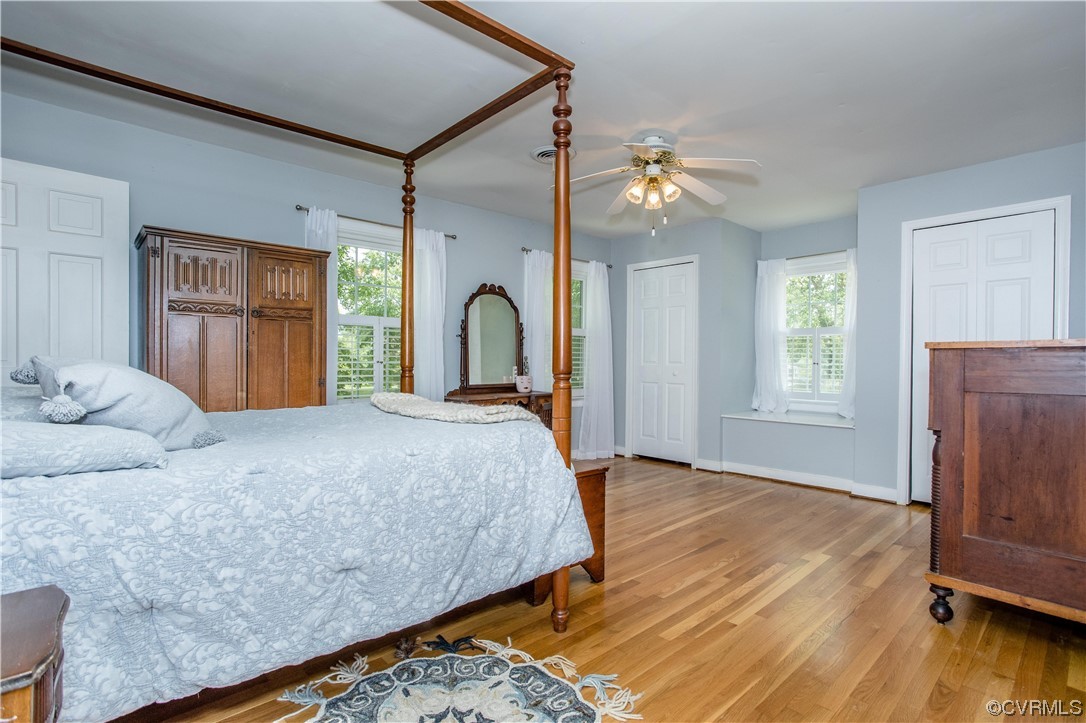 3911 Cresthill Road Chester, VA 23831 - Photo 13 of 50 a bedroom with a bed and a chandelier