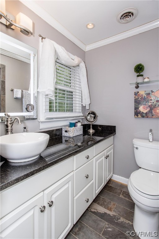 3911 Cresthill Road Chester, VA 23831 - Photo 18 of 50 a bathroom with a granite countertop sink a toilet and a large mirror