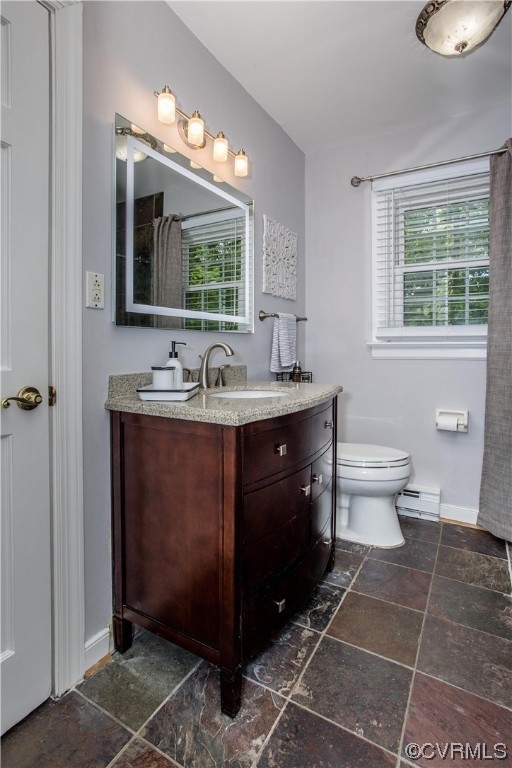 3911 Cresthill Road Chester, VA 23831 - Photo 20 of 50 a bathroom with a toilet sink and mirror