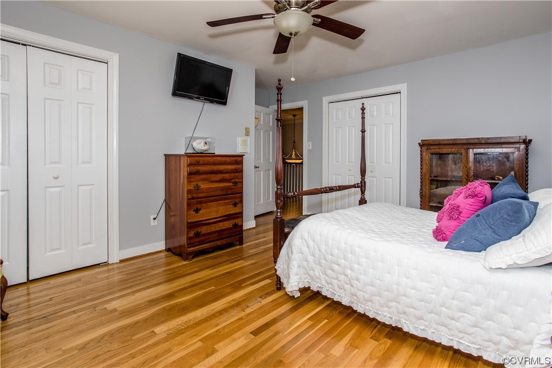 3911 Cresthill Road Chester, VA 23831 - Photo 24 of 50 a bedroom with a bed and flat screen tv