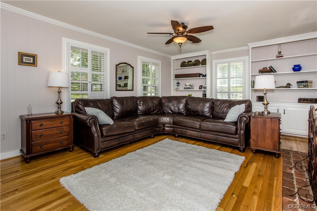 3911 Cresthill Road Chester, VA 23831 - Photo 29 of 50 a living room with furniture wooden floor and window