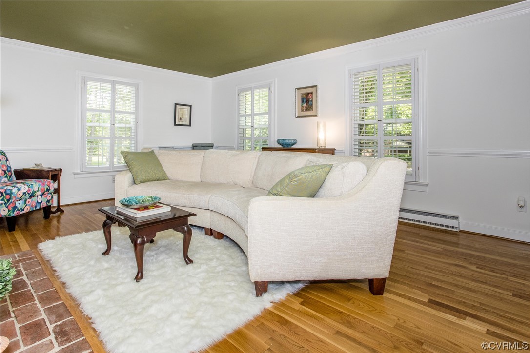 3911 Cresthill Road Chester, VA 23831 - Photo 40 of 50 a living room with furniture and a wooden floor