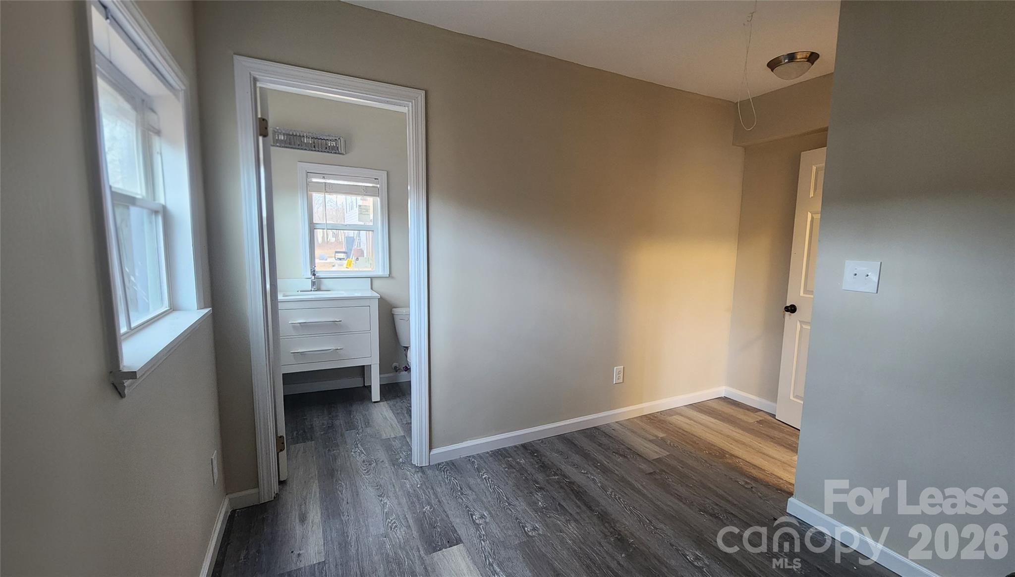 118 Fisherman Cove Road Belmont, NC 28012 - Photo 5 of 12 a view of room with window and wooden floor