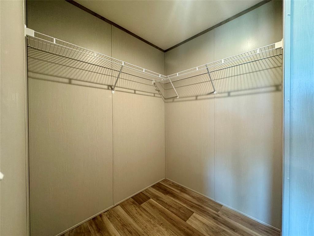 706 Sandpiper Circle Seven Points, TX 75143 - Photo 19 of 22 a view of a room with racks on the wall